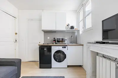 Cuisine ou kitchenette dans l'établissement Apartment Lyon Train Station Bastille