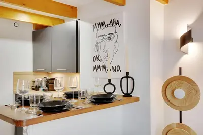 Cuisine ou kitchenette dans l'établissement Duplex Cosy Canal Saint Martin