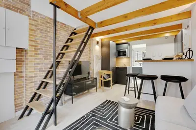 Cuisine ou kitchenette dans l'établissement Duplex Cosy Canal Saint Martin