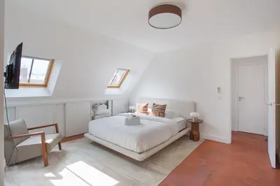 Un ou plusieurs lits dans un hébergement de l'établissement Appartement climatisé 1BR Triangle d'Or