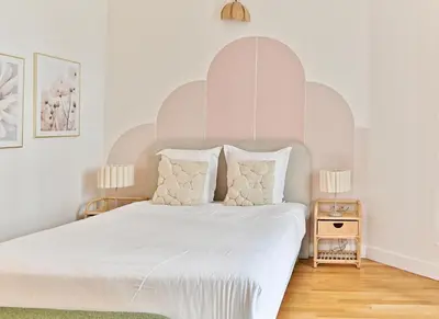 Un ou plusieurs lits dans un hébergement de l'établissement Appartement moderne et climatisé - Arc de Triomphe
