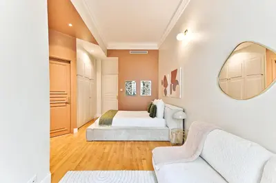 Un ou plusieurs lits dans un hébergement de l'établissement Appartement moderne et climatisé - Arc de Triomphe