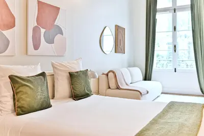 Un ou plusieurs lits dans un hébergement de l'établissement Appartement moderne et climatisé - Arc de Triomphe