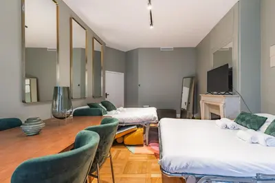 Un ou plusieurs lits dans un hébergement de l'établissement Élégant appartement 1BR - 16ème arrondissement