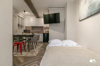 Un ou plusieurs lits dans un hébergement de l'établissement MBA - Splendide appartement Proche Marais