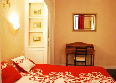 Un ou plusieurs lits dans un hébergement de l'établissement Hôtel Avenir Jonquière