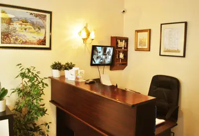 Télévision ou salle de divertissement dans l'établissement Hôtel Avenir Jonquière