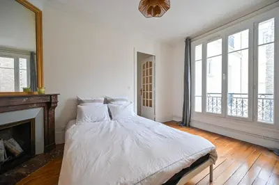 Un ou plusieurs lits dans un hébergement de l'établissement Apartment Suite Parties 17
