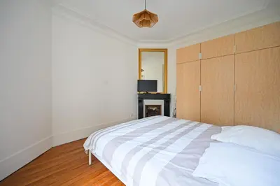 Un ou plusieurs lits dans un hébergement de l'établissement Apartment Suite Parties 17