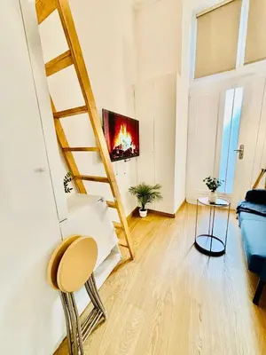 Télévision ou salle de divertissement dans l'établissement Studio Penthievre Champs Elysée