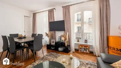 Télévision ou salle de divertissement dans l'établissement App à 5 minutes de la Tour Eiffel