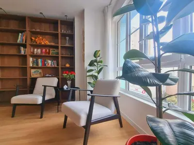 Coin salon dans l'établissement Appartement neuf et moderne à Puteaux