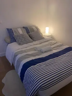 Un ou plusieurs lits dans un hébergement de l'établissement Loft de luxe à deux pas du panthéon
