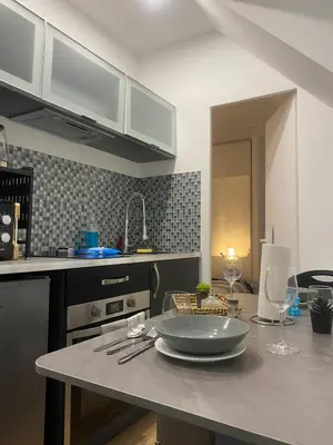 Cuisine ou kitchenette dans l'établissement Loft de luxe à deux pas du panthéon