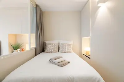 Un ou plusieurs lits dans un hébergement de l'établissement Appartement d'Architecte Design & Calme