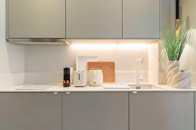Cuisine ou kitchenette dans l'établissement Appartement d'Architecte Design & Calme