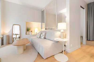 Un ou plusieurs lits dans un hébergement de l'établissement Appartement d'Architecte Design & Calme