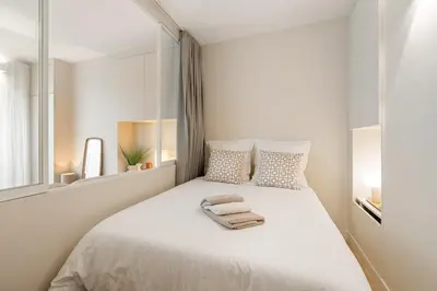 Un ou plusieurs lits dans un hébergement de l'établissement Appartement d'Architecte Design & Calme