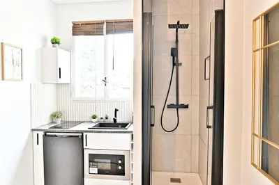 Cuisine ou kitchenette dans l'établissement Petit studio charmant près de Paris - III