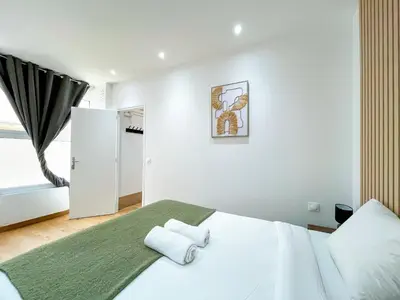 Un ou plusieurs lits dans un hébergement de l'établissement Urban Flat 198 - Townhouse Basfroi