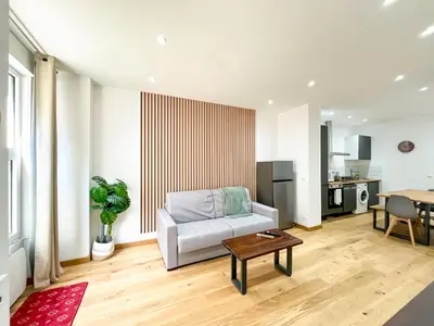 Coin salon dans l'établissement Urban Flat 198 - Townhouse Basfroi