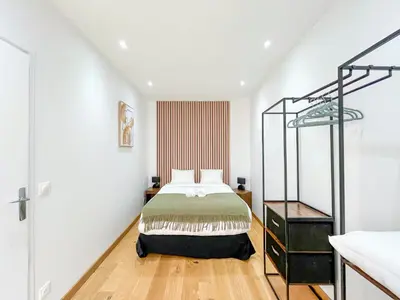 Un ou plusieurs lits dans un hébergement de l'établissement Urban Flat 198 - Townhouse Basfroi