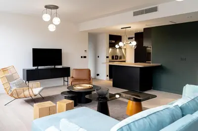 Télévision ou salle de divertissement dans l'établissement Amazing appartements on Champs-Elysées
