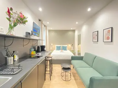 Coin salon dans l'établissement GuestReady - Cozy green haven in Paris 13