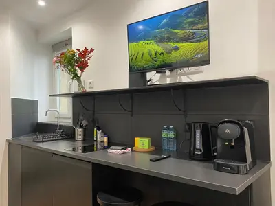 Cuisine ou kitchenette dans l'établissement GuestReady - Cozy green haven in Paris 13