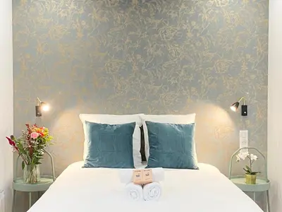 Un ou plusieurs lits dans un hébergement de l'établissement GuestReady - Cozy green haven in Paris 13