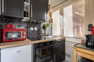Cuisine ou kitchenette dans l'établissement Appartement de charme, Maison des examens, Paris ligne 14