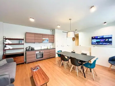 Cuisine ou kitchenette dans l'établissement Urban Flat 138 - Beautiful Duplex in Saint Germain