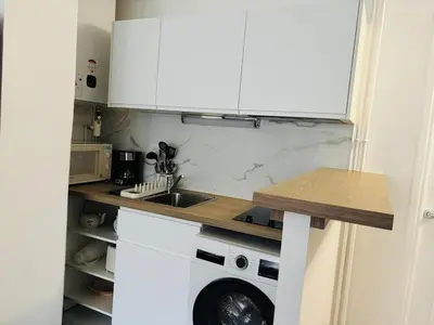 Cuisine ou kitchenette dans l'établissement Nid Asnières escapade cosy aux portes de Paris