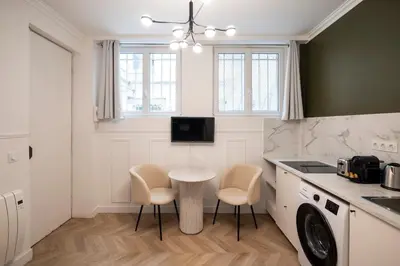Cuisine ou kitchenette dans l'établissement Charmant studio à Pigalle