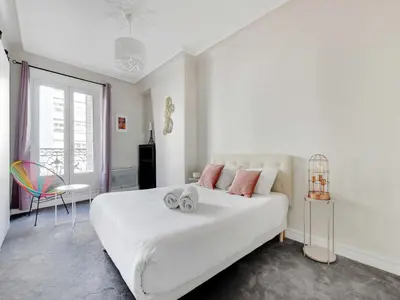 Un ou plusieurs lits dans un hébergement de l'établissement Bright apartment - 2BR-4P - Belleville
