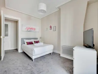 Un ou plusieurs lits dans un hébergement de l'établissement Bright apartment - 2BR-4P - Belleville