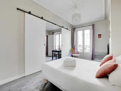 Un ou plusieurs lits dans un hébergement de l'établissement Bright apartment - 2BR-4P - Belleville