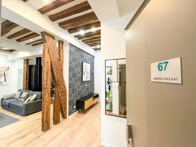 Un ou plusieurs lits dans un hébergement de l'établissement Urban Flat 67 - Spacious Flat in Central Paris