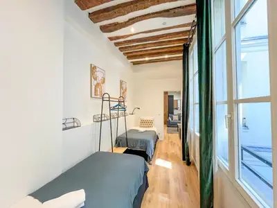 Un ou plusieurs lits dans un hébergement de l'établissement Urban Flat 67 - Spacious Flat in Central Paris