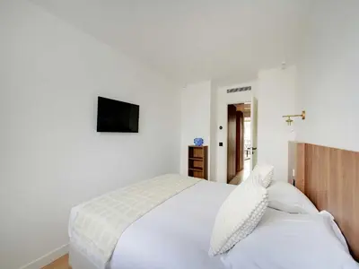 Un ou plusieurs lits dans un hébergement de l'établissement Elegant apartment - AC- 1BR- Neuilly-sur-Seine