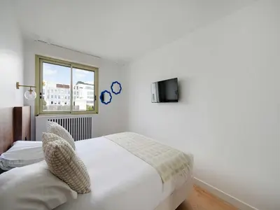 Un ou plusieurs lits dans un hébergement de l'établissement Elegant apartment - AC- 1BR- Neuilly-sur-Seine