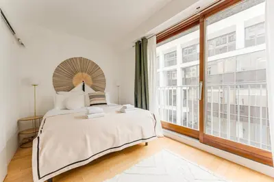 Un ou plusieurs lits dans un hébergement de l'établissement Trocadero 1Bedroom 4 people