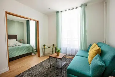 Un ou plusieurs lits dans un hébergement de l'établissement Paris 2 - Vendôme - Rue Volney - 2 rooms