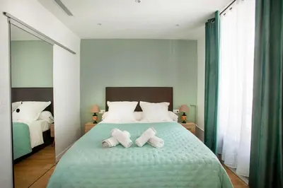Un ou plusieurs lits dans un hébergement de l'établissement Paris 2 - Vendôme - Rue Volney - 2 rooms