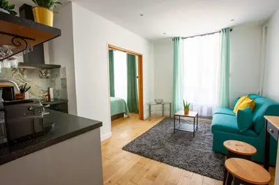 Coin salon dans l'établissement Paris 2 - Vendôme - Rue Volney - 2 rooms
