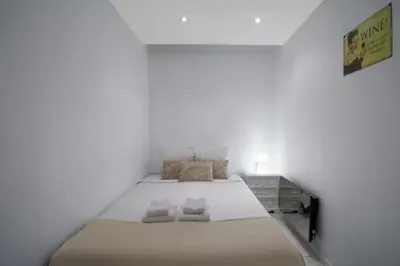 Un ou plusieurs lits dans un hébergement de l'établissement Appartement Popincourt Bastille