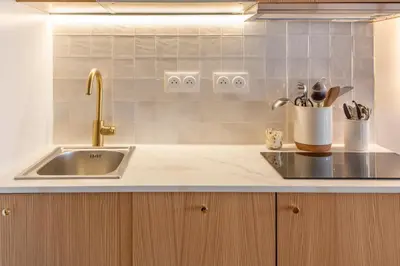 Cuisine ou kitchenette dans l'établissement Louvre - Rivoli - Designer Studio - Sleeps 3P