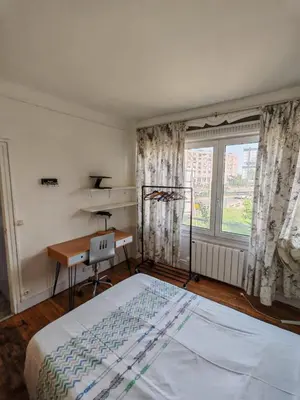 Un ou plusieurs lits dans un hébergement de l'établissement Cozy Apartment Montrouge Paris