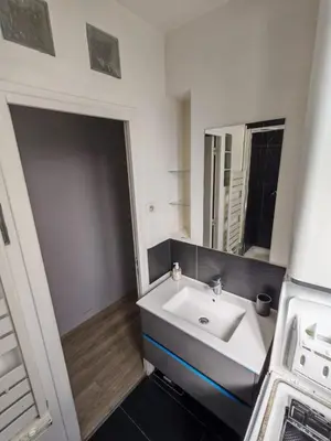 Un ou plusieurs lits dans un hébergement de l'établissement Cozy Apartment Montrouge Paris