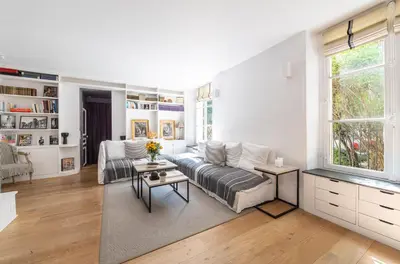 Coin salon dans l'établissement Louvre l Souplex à 15min du Jardin du Luxembourg